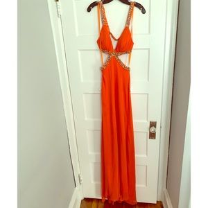 Backless prom dress with gems